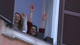 Balcony singsong for Rome residents trying to stave off coronavirus blues  AFP [upl. by Olegna]