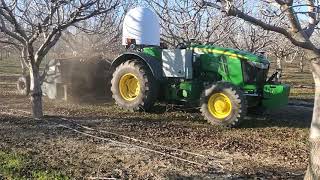 Pulling massive TMC Shredder with Fully Autonomous John Deere 5115ML Orchard Tractor [upl. by Leena398]