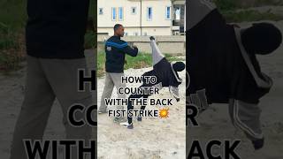 How to counter with the backfist strike karate ufc mma [upl. by Daveta]