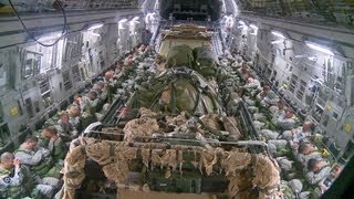 C17 Heavy and Personnel Drop Onto the Aircraft and Takeoff [upl. by Narak]