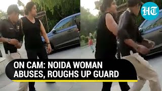 Noida shocker Woman hurls abuses beats up security guard over delay in opening gate I Viral [upl. by Ab579]