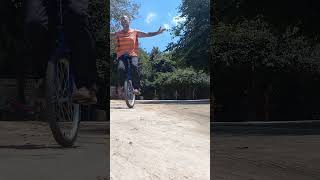 Unicycles unicycling penny farthing high wheel mike arotsky in thailand temple talks about the mind [upl. by Aihsyak674]