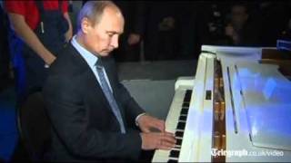 Vladimir Putin plays piano in singalong at Moscow theatre [upl. by Nylarat]