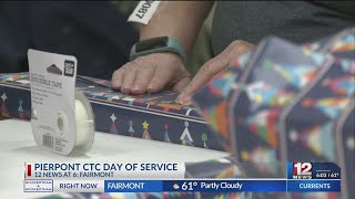 Volunteers in Fairmont wrap presents for families in need [upl. by Codd]