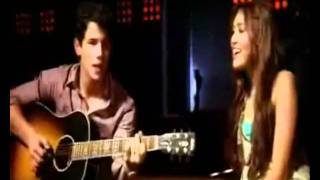 nick jonas give love a try en español [upl. by Ahsyekal]