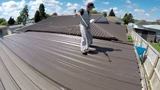 Airless Spray Painting metal roof roofpainting roofspraying [upl. by Kimmi643]