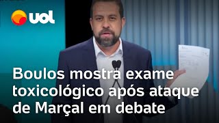 Debate na Globo Boulos mostra exame toxicológico após Marçal associálo ao uso de drogas [upl. by Seuqirdor]