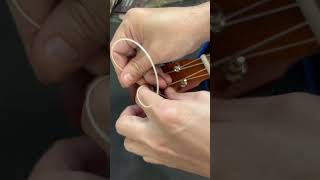 How to string a ukulele using the lock in method ukulele restringtutorial ukulelerestring [upl. by Arela480]