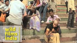 Indian women getting their heads shaved at Varanasi ghat [upl. by Queston]