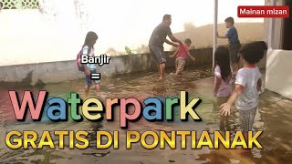 Children playing in flood water in Jeruju Pontianak Borneo Indonesia January 2024 [upl. by Ynnel]