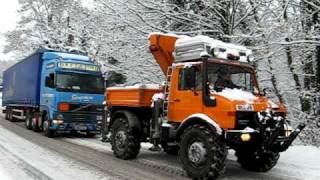 UnimogU1700 towing lorry stuck in the snow [upl. by Artsa224]