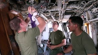 Marine Corps Avionic Technicians Working On CH53E Super Stallion Helicopter [upl. by Aiynot572]