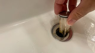 How to Remove a Bathroom Sink Pop Up Stopper [upl. by Garcia]