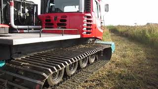 PistenBully PB200 mowing with MERA SK275 flail mower [upl. by Mailand]