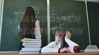 Two high school girls at the blackboard in their class [upl. by Eoz]