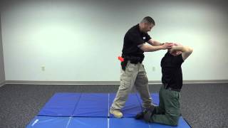 Kneeling Handcuff and Search Defensive Tactics [upl. by Eicaj]