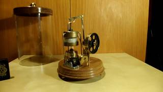 Stirling engine with musicbox in glass tube [upl. by Leonelle640]