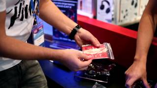 Игромир 2013 Мобильные наушники Mad Catz FREQ M [upl. by Raddie604]