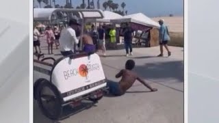 Venice pedicab driver breaks up fight by driving his bike into brawl [upl. by Nodnyl]