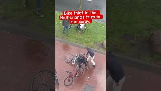 Bike thief in the Netherlands tries to run away with 2 bikes bikethief bikestolen [upl. by Yruy182]