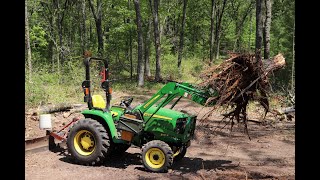 John Deere 3025e removing stumps [upl. by Drye]