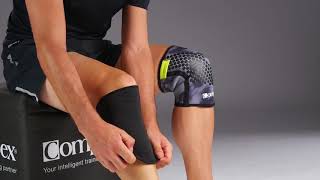 Jak dopasować i jak założyć Stabilizator na kolano Compex Power Knee Sleeve [upl. by Adnir]