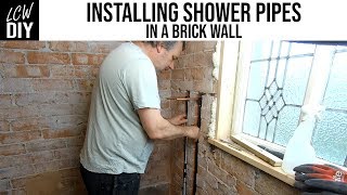 How to Install Shower Pipes in a Brick Wall  Bathroom Renovation 04  DIY Vlog 19 [upl. by Attenahs]