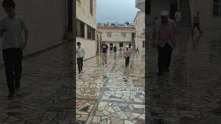 Worshippers exiting rainy Çeliktepe Central Mosque jumma prayer fridayfeeling peace travel [upl. by Kamaria]