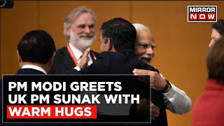 G7 Summit PM Modi Greets UK PM Rishi Sunak amp US President Biden With Warm Hugs  Top News [upl. by Wittenburg611]