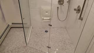 Custom shower door  Bifold handicap accessible enclosure [upl. by Kcirdaed]