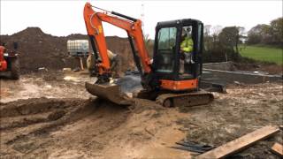 Mini Excavator working with very wet mud [upl. by Hawk704]