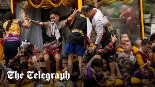 Millions of Filipinos swarm statue of Jesus for Black Nazarene procession [upl. by Adoh]