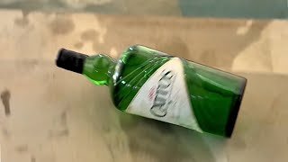 Breaking glass bottles satisfying video  throwing glass bottles  break and crunchy experment [upl. by Lawlor]