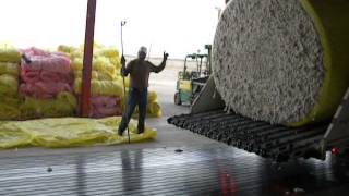 unwrapping cotton bales at broadview co op gin firebaugh ca [upl. by Thurman]