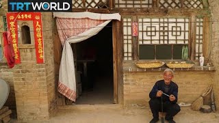 China Caves Cave dwellers reluctant to move to new homes [upl. by Ttirb]