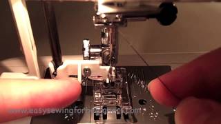 How to use the Automatic Needle Threader on a Sewing Machine [upl. by Bertold]