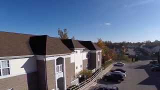 The Crest on East 10th Apartments Aerial Video [upl. by Ellerehc201]