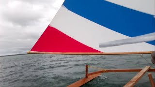 Outrigger sailing trying a larger sail [upl. by Ralfston592]