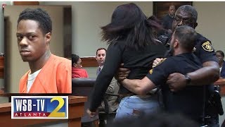 WATCH Murder victims teen daughter lunges at accused killer removed from courtroom  WSBTV [upl. by Dnomse]