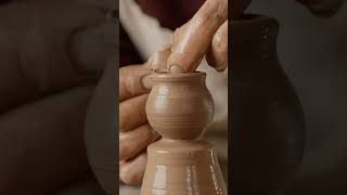 Man potter working on potters wheel making vase from clay Potter at work pottery [upl. by Finny]