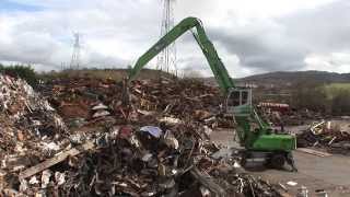 SENNEBOGEN  Scrap Handling 830 Mobile Material Handler loading scrap into shredder at SIMS UK [upl. by Bonita339]