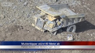 21102014 KG Muldenkipper stürzt 60 Meter in die Tiefe  Fahrer entkommt mit Verletzungen [upl. by Delilah]