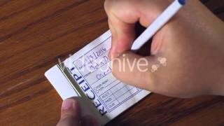 Receipt Book STOCK FOOTAGE [upl. by Nayd648]