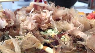 お好み焼き Fish flakes wiggling on top of a delicious okonomiyaki [upl. by Safko]