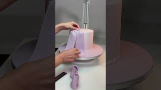 How to make a large cascading fondant bow cake fondantbow sugarbow howto cakedecorating cakeart [upl. by Beeck781]