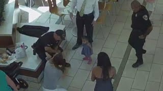 Surveillance video shows 2 officers saving choking baby [upl. by Born]