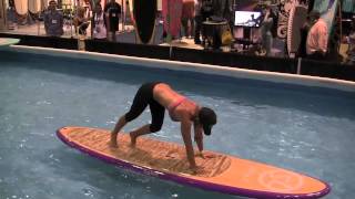 Amazing SUP Yoga demonstration at Surf Expo [upl. by Ashlie]