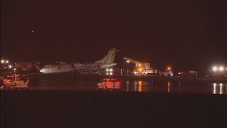 Flooding causes plane to slide from runway in Spain [upl. by Ryon]