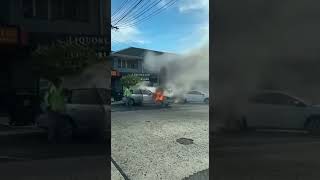 Man ignores the fact his car is on fire and loads it up with beer [upl. by Maynard]