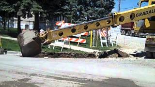 Landmark Contracters Gradall XL4100 digging for curb to be replaced [upl. by Solhcin521]